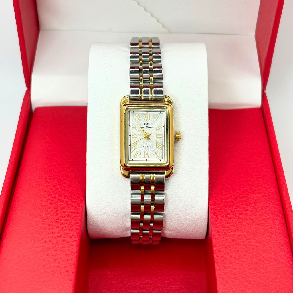 montre pour femme dorée argentée
