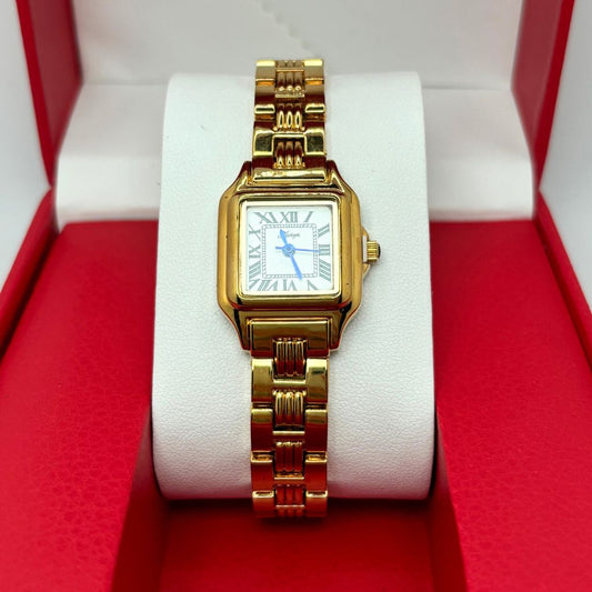 montre féminine dorée 